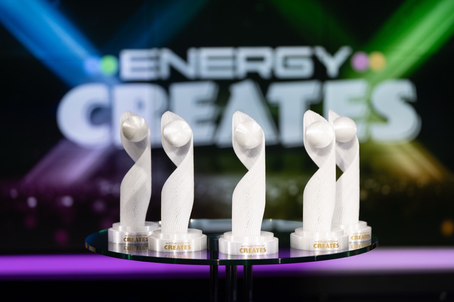 The five Energy Creates scholarship trophies on the award show stage.